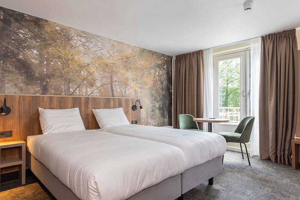 Charming Woodland Stay with Free Parking and Indoor Pool, Near Valkhof Museum! in Berg en Dal, Betuwe