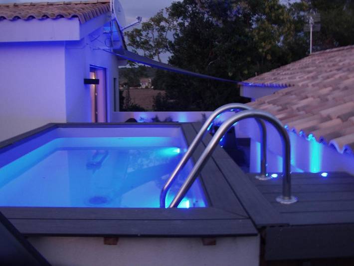 Appartement de vacances pour 4 personnes, avec piscine ainsi que vue et jardin