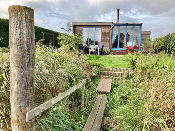 Bungalow voor 4 personen, with Balkon/Terras and Tuin as well as Sauna and Uitzicht in Lauwersmeer