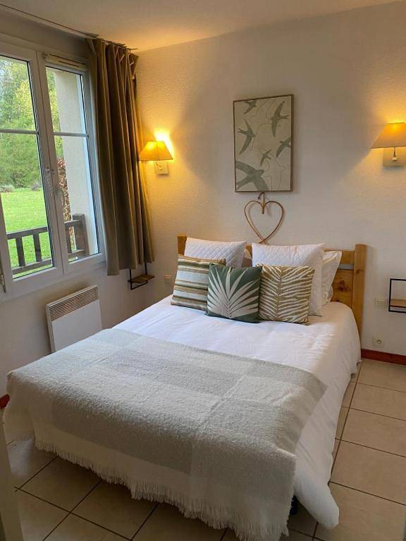 Appartement de vacances pour 6 personnes, avec sauna et terrasse ainsi que piscine et jardin