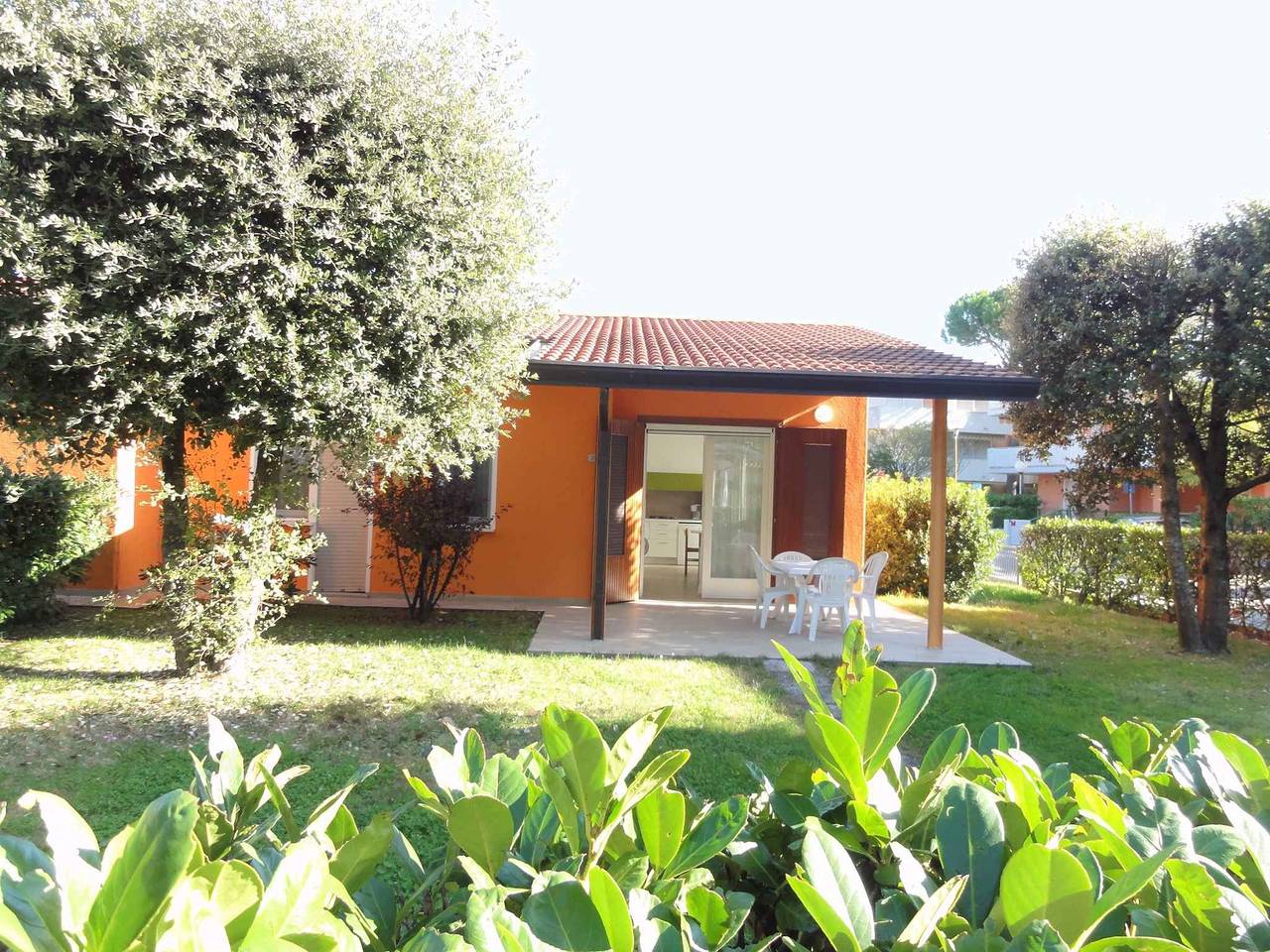 Entire holiday apartment, Holiday apartment Townhouse near the sea with large fenced garden  in Bibione, Venice Province