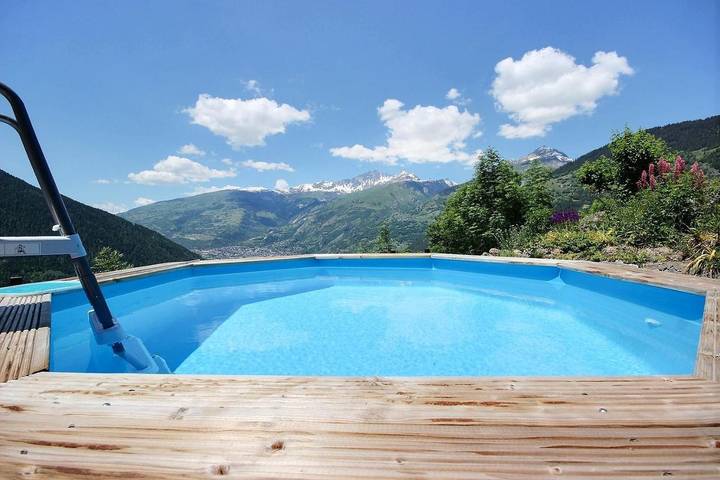 Appartement de vacances pour 4 personnes, avec piscine ainsi que vue et jardin