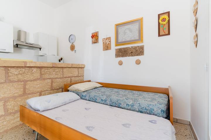 Apartamento entero, Apartamento 'E Case Tu Bertu - Gallipoli' con piscina privada, terraza privada y aire acondicionado in Taviano, Golfo de Tarento
