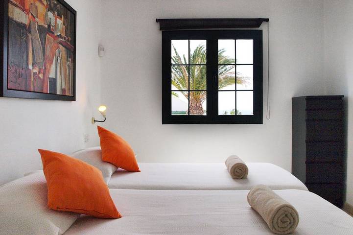 Appartement entier, Appartement moderne à l'étage avec vue sur la mer, Wifi, climatisation et climatisation. la télé in Puerto del Carmen, Tías