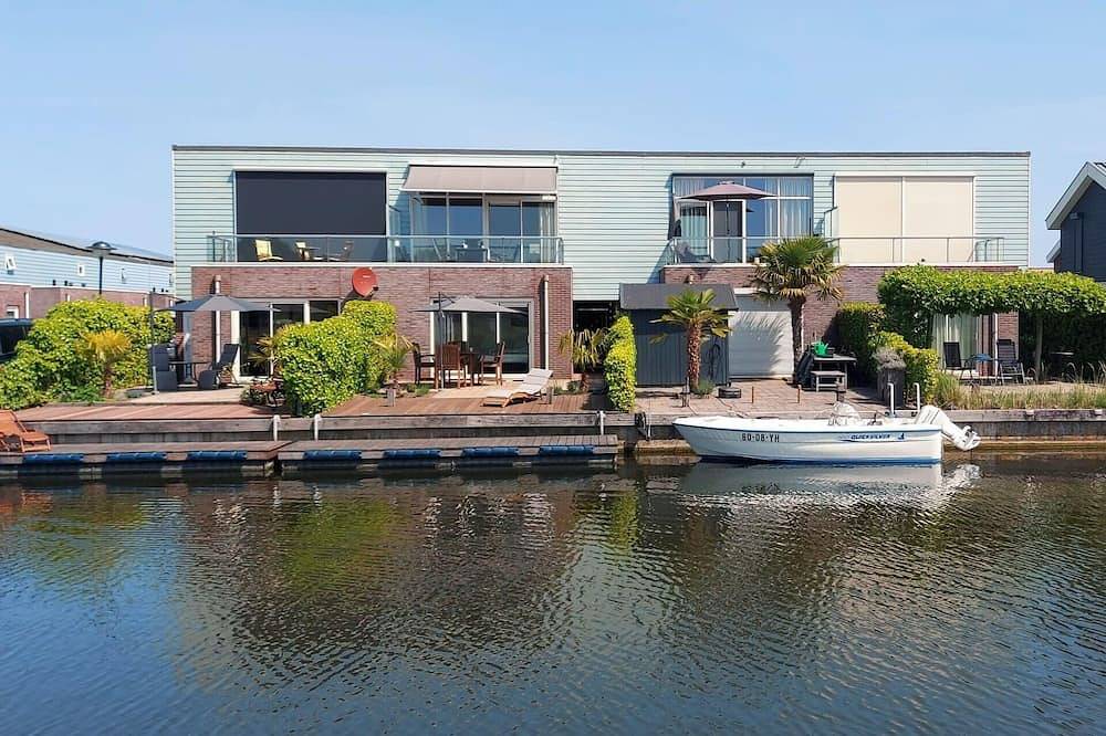 Hübsches Inselhaus mit schöner Aussicht und herrlicher Dachterrasse. in Oude-Tonge, Goeree-Overflakkee