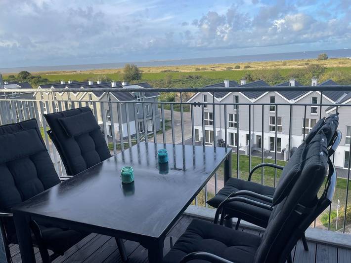 Ferienwohnung für 4 Personen, mit Ausblick und Balkon sowie Sauna in Schillig