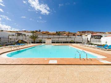 Bungalow para 4 personas, con vistas además de piscina y jardín en Caleta de Fuste