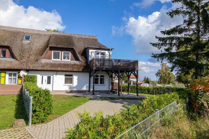 Ferienhaus mit Meerblick für 2 Personen, mit Balkon und Terrasse sowie Garten und Sauna in Freest