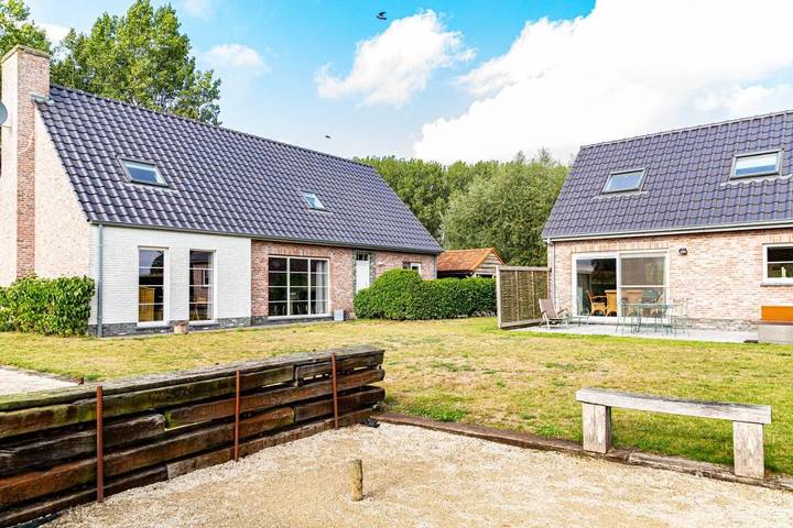 Location de vacances pour 14 personnes, avec Terrasse ainsi que Jardin et Vue à Maldegem