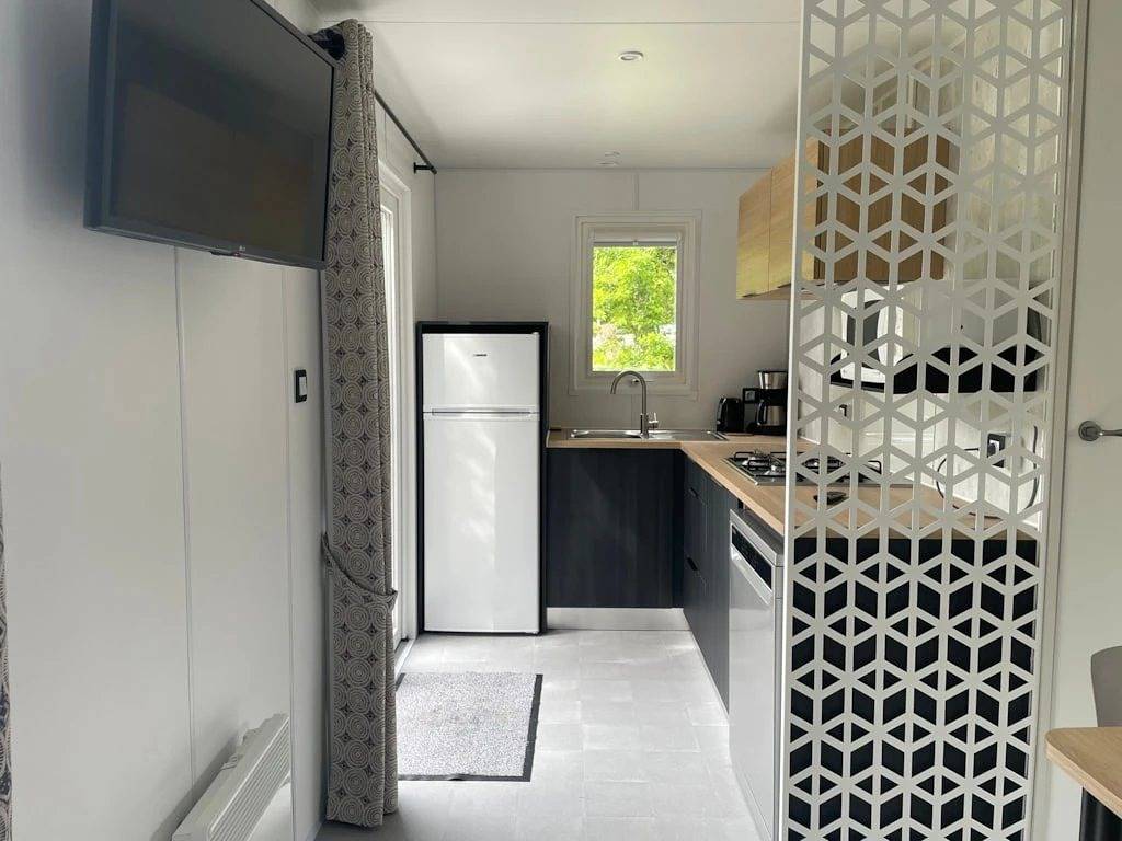 Zecamping 4 étoiles 200m plage piscine couverte mobil-home Tv Lv 30m2 in Raguenes, Névez
