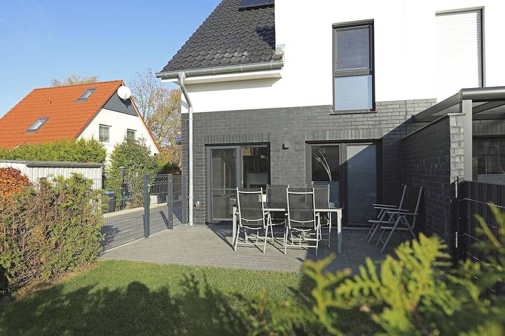 Ferienhaus für 8 Personen, mit Terrasse und Whirlpool sowie Garten und Sauna