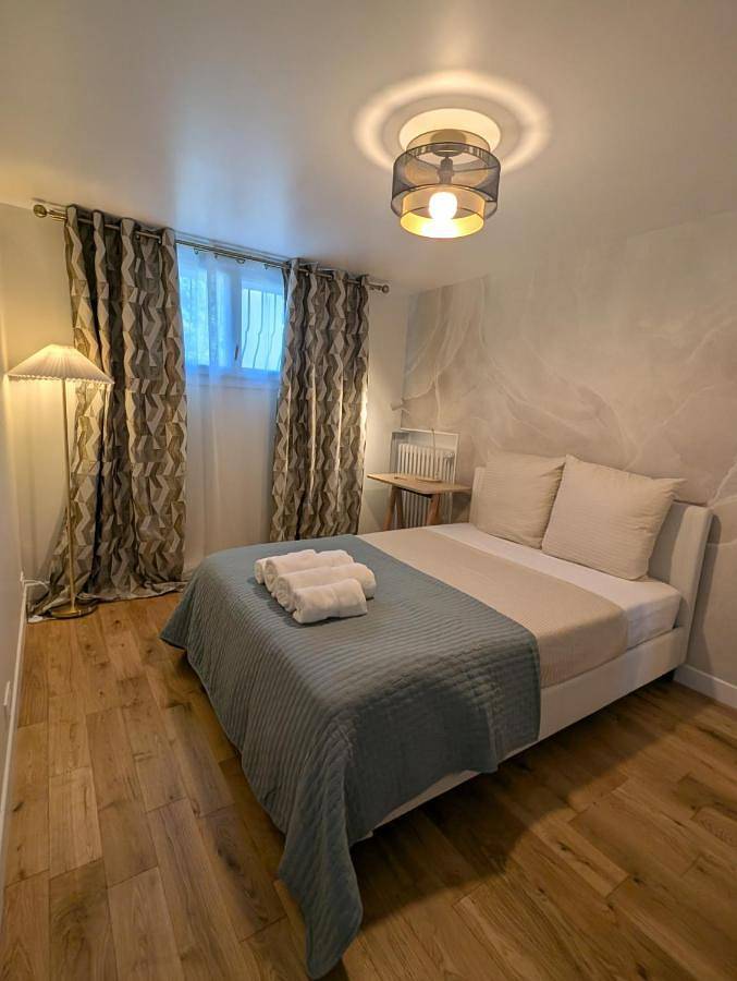 Appartement de vacances pour 2 personnes, avec Balcon et Terrasse ainsi que Jardin et Vue à Saint-Gratien