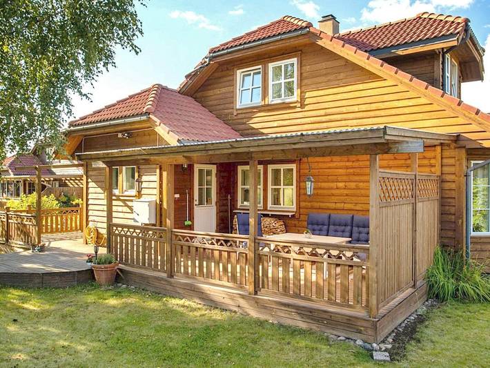 Ferienhaus für 4 Personen, mit Balkon und Terrasse sowie Garten und Sauna