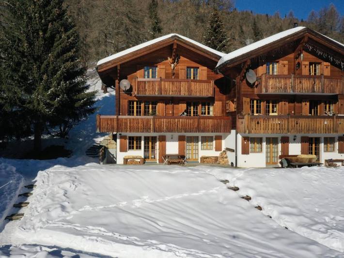 Ferienhaus für 8 Personen, mit Balkon und Terrasse sowie Garten in Bellwald