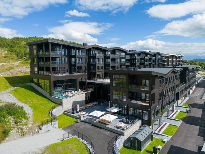 Resort for 4 personer, Jacuzzi og Terrasse i tillegg til Barnebasseng og Badebasseng i Oppland