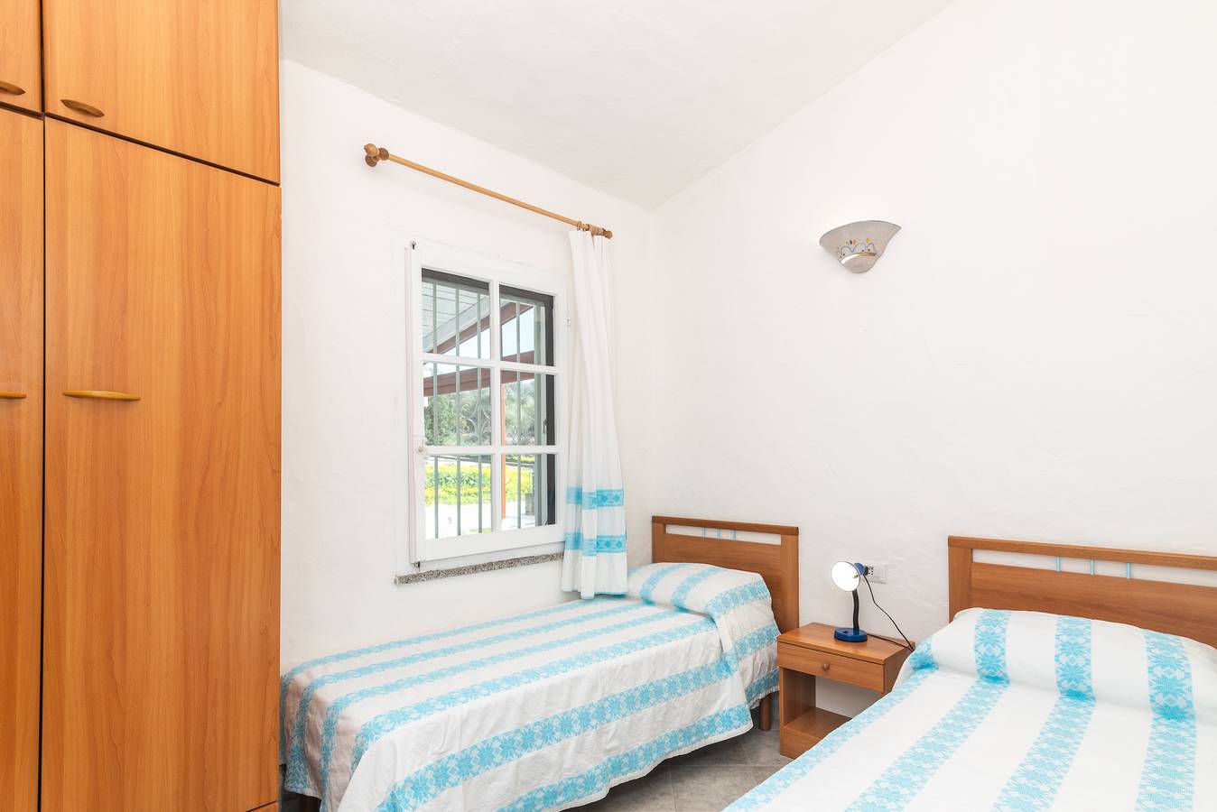 Ganze Wohnung, Ferienwohnung 'Bilocale Bianco Tamerici' mit privater Terrasse und Klimaanlage in San Teodoro, Olbia-Tempio