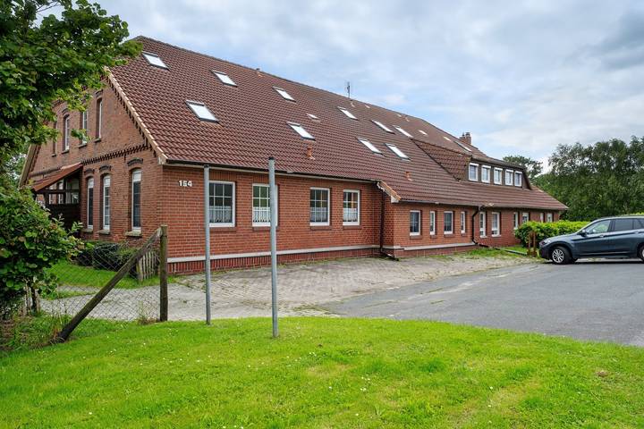 Geheel appartement, Appartement 'Ferienwohnung Jadebusen' met Uitzicht op Zee en Eigen Tuin in Jade , Wesermarsch