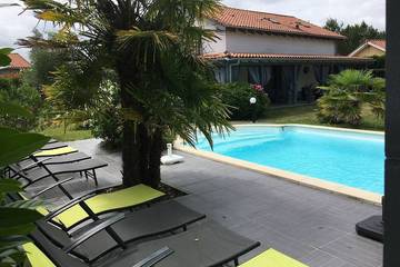 Villa pour 10 personnes, avec jardin et balcon à Mimizan
