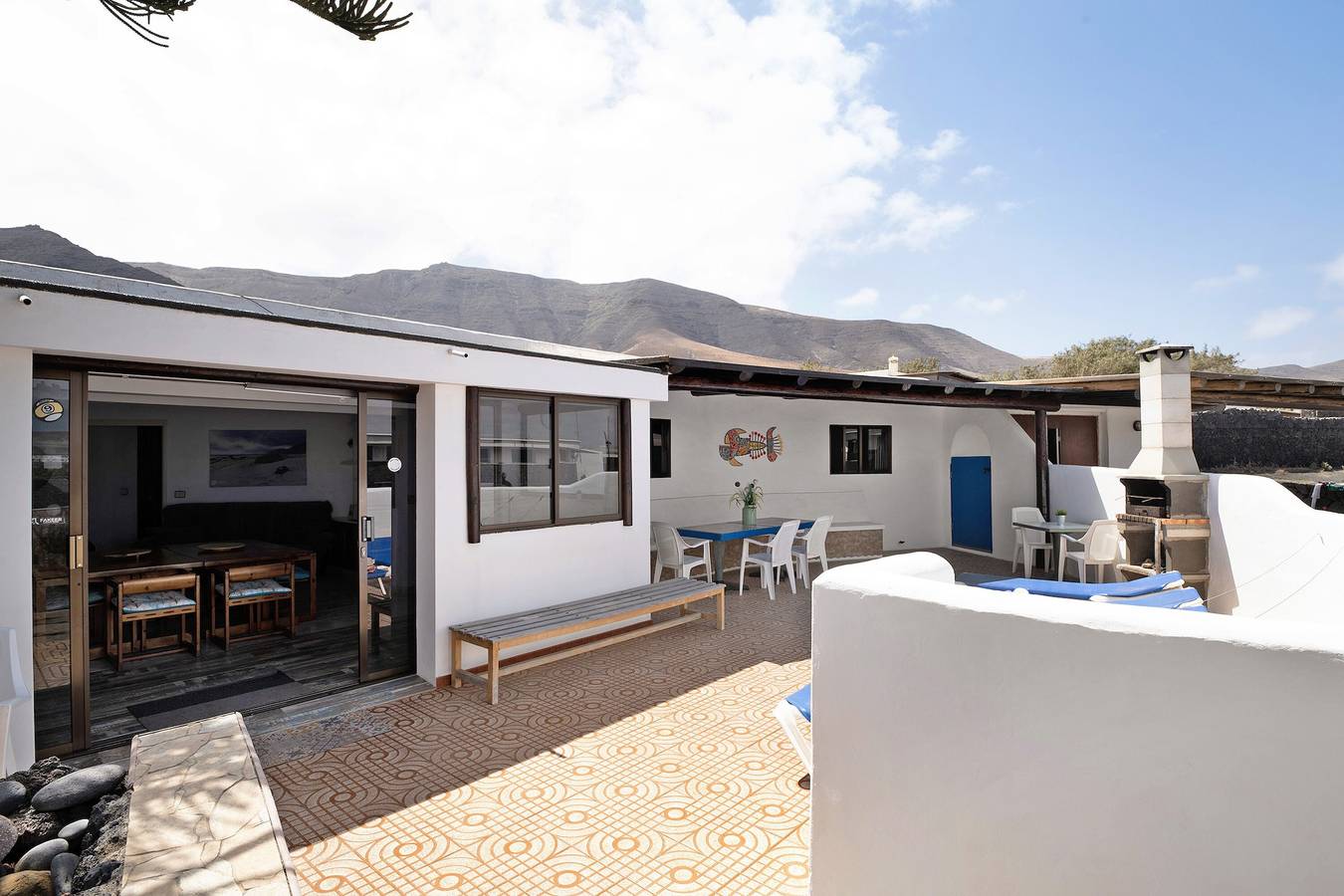 Vacation Home 'Bungalow Famara, Lanzarote' with Sea View, Private Terrace and Wi-Fi in Famara Beach, Teguise
