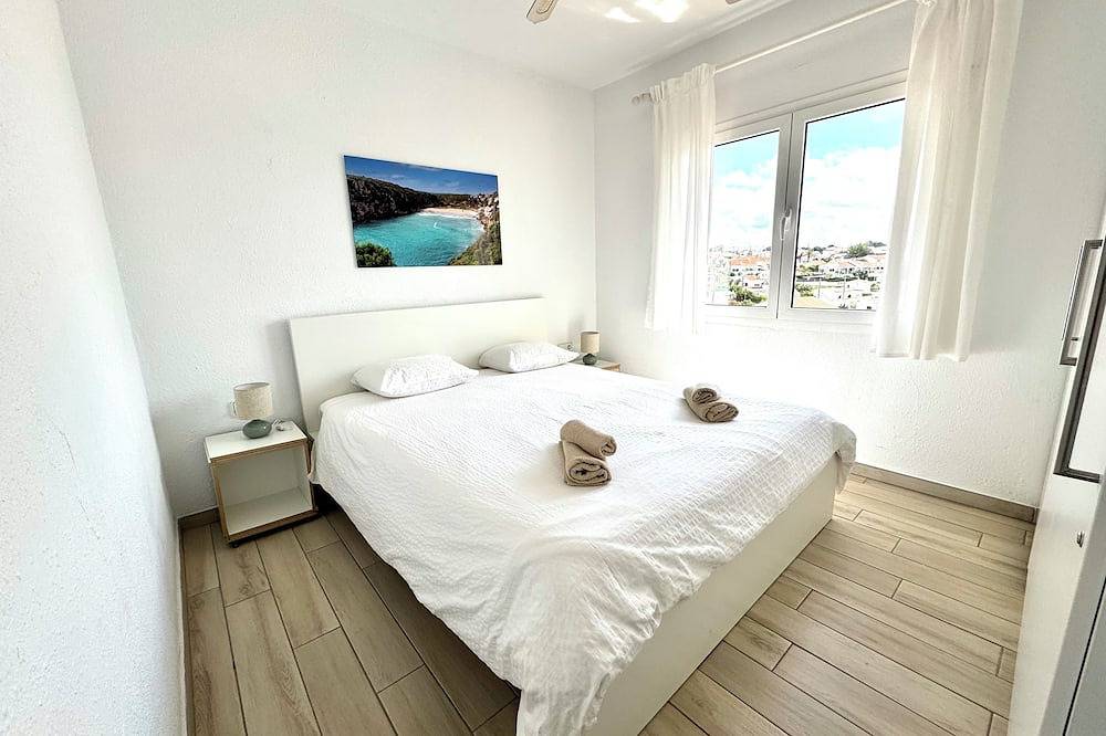 Apartamento entero, Apartamento moderno con una vista fantástica sobre la bahía. in Cala en Porter, Municipio de Alaior