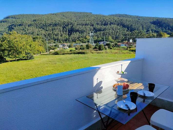 Apartamento para 4 personas, con vistas además de piscina y jardín en Castañeda