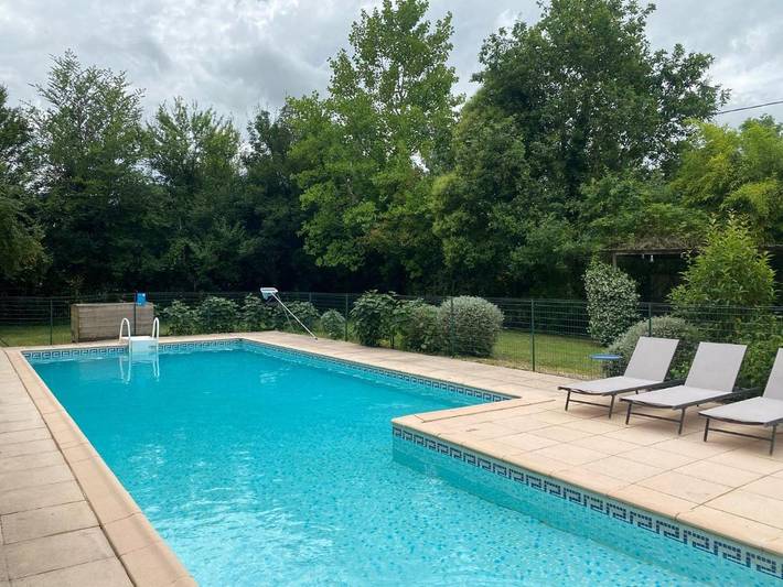 Maison de vacances pour 7 personnes, avec Terrasse et Jardin ainsi que Bassin pour enfant et Piscine