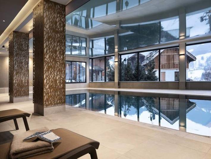 Chalet pour 8 personnes, avec piscine ainsi que balcon et sauna, animaux acceptés à Les Contamines-Montjoie