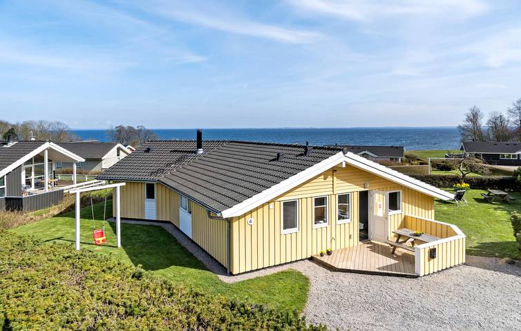 Ferienhaus für 8 Personen, mit Terrasse und Whirlpool sowie Garten und Sauna in Mommark