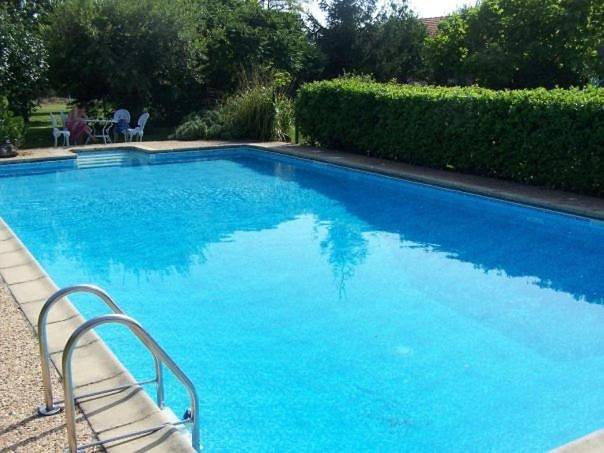 Appartement de vacances pour 4 personnes, avec jardin ainsi que piscine et vue, animaux acceptés