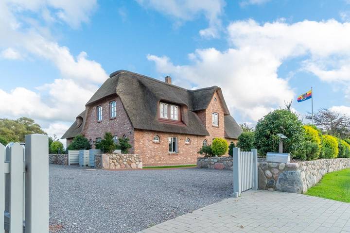 Ferienhaus für 6 Personen, mit Terrasse und Garten sowie Sauna und Ausblick in Süderende