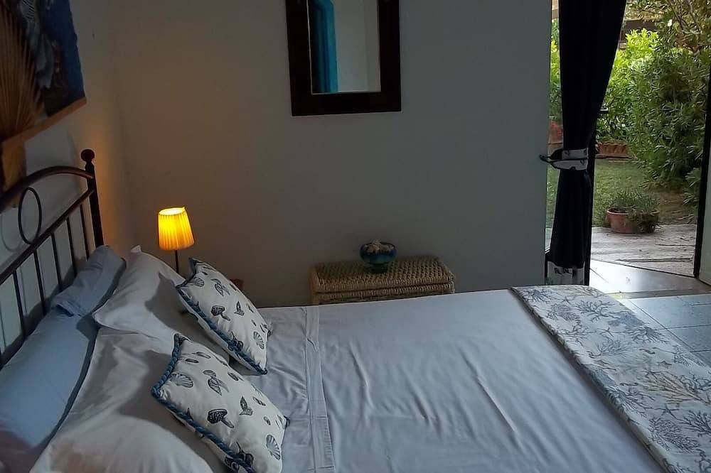 Appartamento intero, Appartamento con 2 camere, giardino privato,acceso privato al mare e piscina in Cala Piccola, Maremma