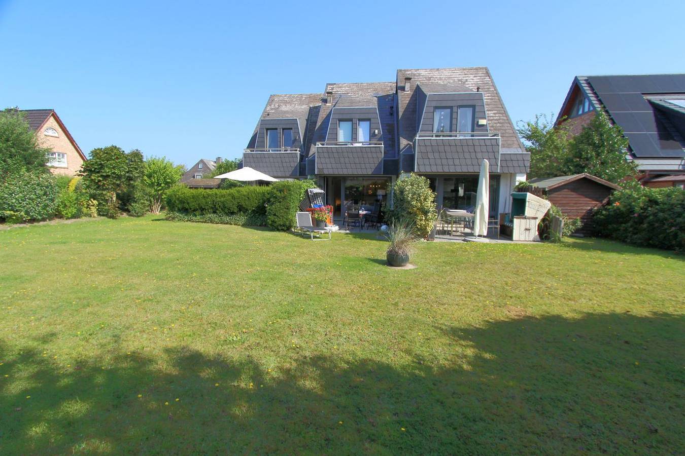 Ganze Wohnung, Ruhig gelegene Wohnung mit Süd-Terrasse und Blick in den Garten in Wenningstedt, Sylt