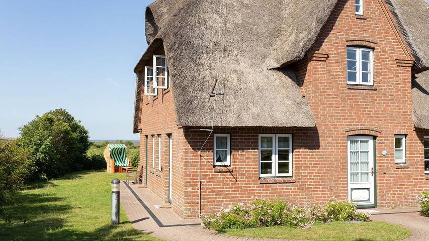 Ferienwohnung für 4 Personen, mit Ausblick und Garten in Norddorf