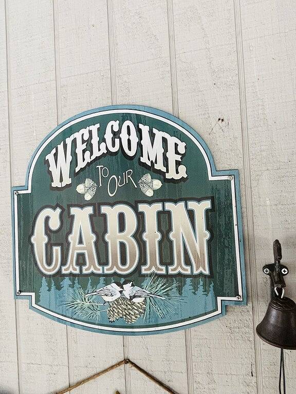 Downtown by Chattahoochee River, sit on front porch as horse and buggy stroll by in Helen, Chattahoochee National Forest