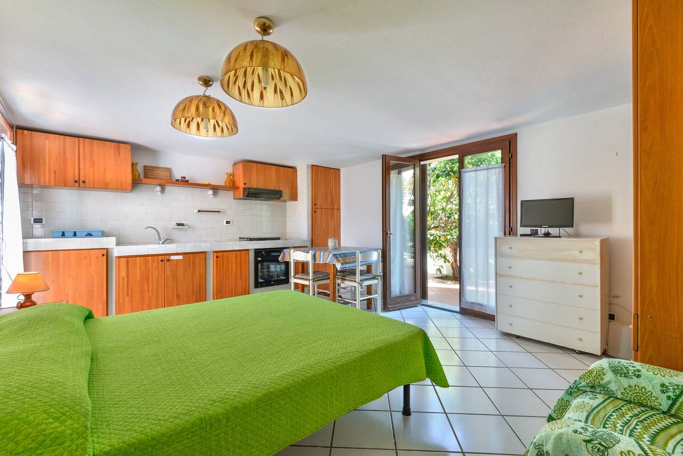 Entire studio, Studio Apartment 'Monolocale Nel Verde' with Private Terrace, Shared Garden and Wi-Fi in Marciana Marina, Elba