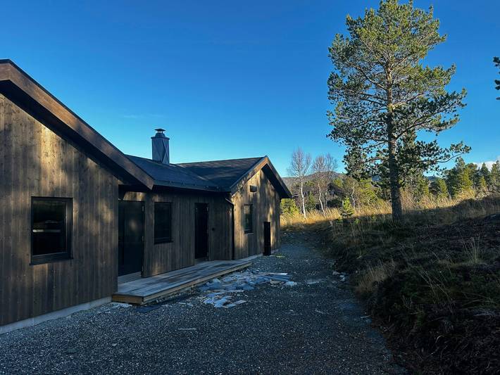 Idyllische Hütte mit Panoramablick auf die Berge in Rennebu
