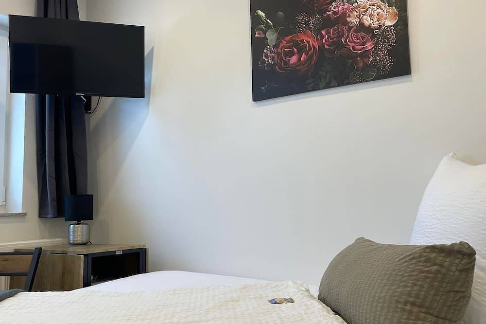 Ganze Wohnung, Appartement Orchidee - Wohn-/Schlafraum - Apartments im Château d'Esprit in Höhr-Grenzhausen, Westerwald