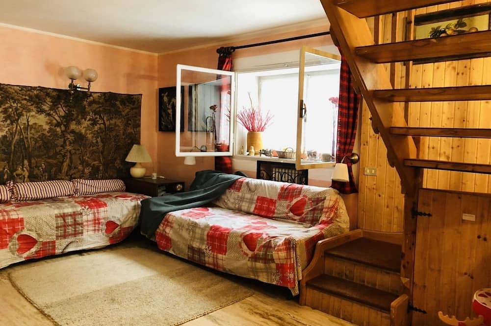 Entire apartment, Guesthost - Cosy 85 sqm flat on 2 levels for 4 people, on the 3th floor of a typical mountain-style building (Without Lift with stairs to access it).We are located in La Thuile, an Alpine resort famous for its ski slopes and peaceful atmosphere, close to in La Thuile (town), La Thuile