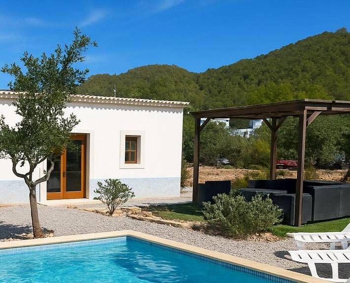 Casa de vacaciones para 4 personas, con vistas además de jardín y piscina, Se admiten mascotas en Ibiza - 2