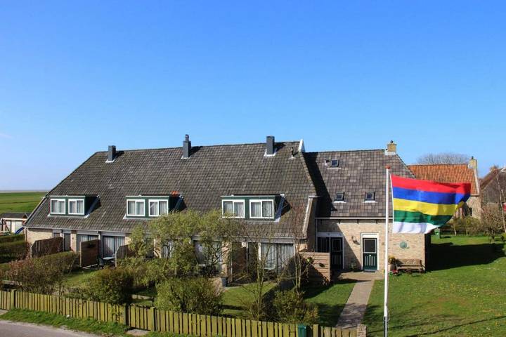 Ferienwohnung für 2 Personen, mit Terrasse und Garten sowie Ausblick in Oosterend