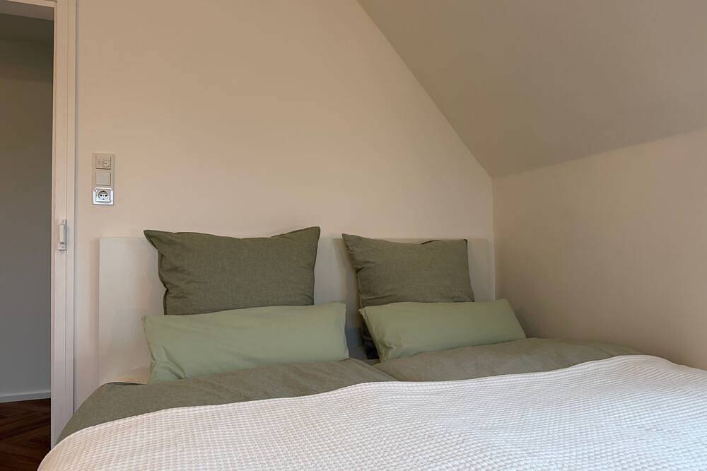 Geheel appartement, Wohnung Himmelreich met zeezicht in het Langhaus Aussichtsreich in Oland, Langeneß