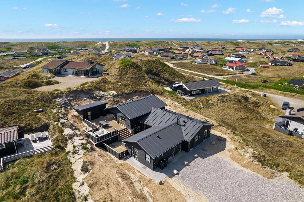 Luxusferienhaus mit Außenwhirlpool, Outdoor- Sauna - Hund erlaubt in Årgab, Holmsland Klit