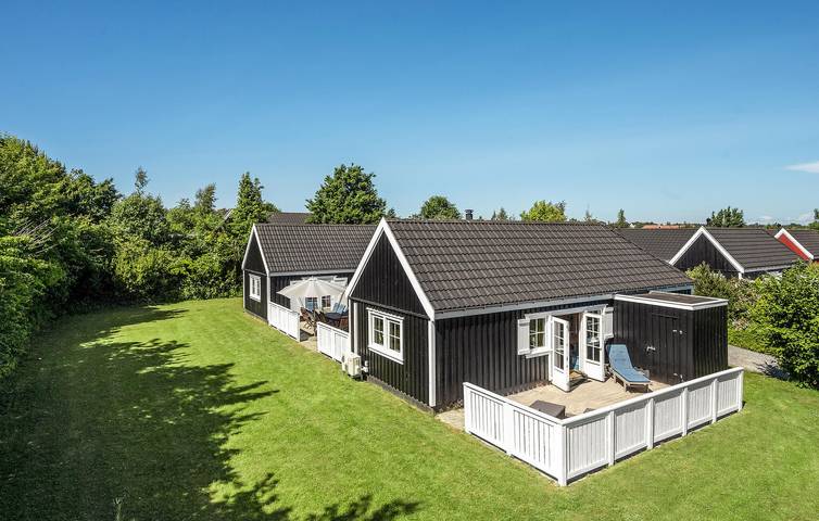Ferienhaus für 8 Personen, mit Terrasse und Garten sowie Sauna