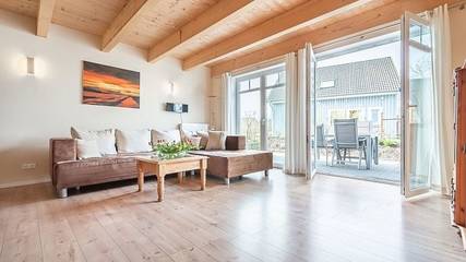 Ferienwohnung für 4 Personen, mit Sauna und Terrasse sowie Garten, mit Haustier in Langholz