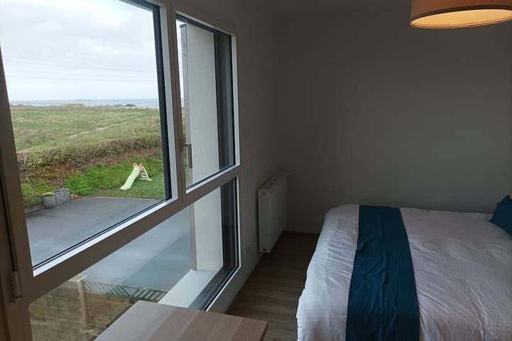 Recent house facing the dunes and Grève Blanche beach, at the foot of the Gr34. in Plouguerneau, Brest region