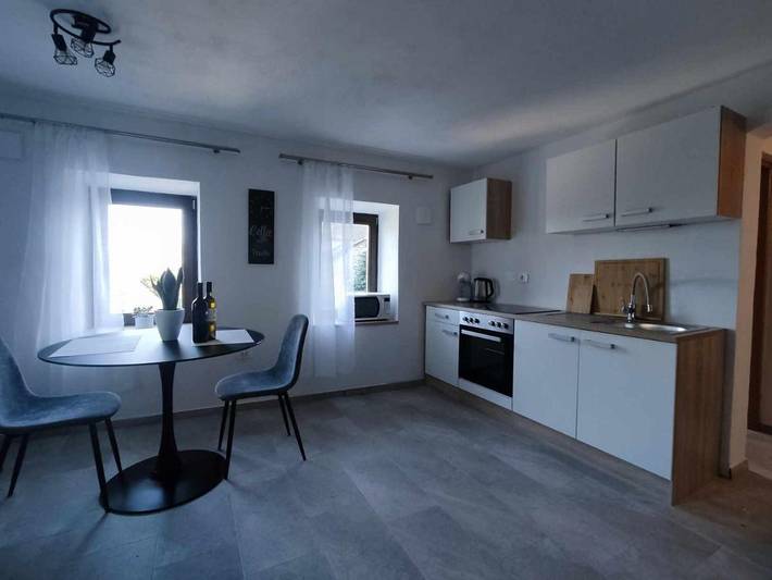 Appartement de vacances pour 2 personnes, avec vue ainsi que jardin et sauna