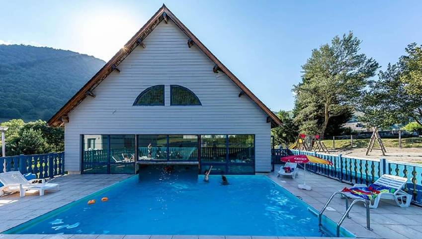 Appartement de vacances pour 4 personnes, avec Balcon et Terrasse ainsi que Jardin et Piscine