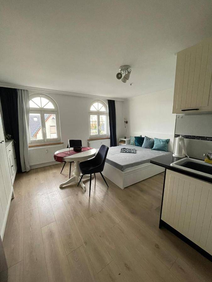 Ferienwohnung für 2 Personen, mit Terrasse und Garten sowie Seeblick und Ausblick