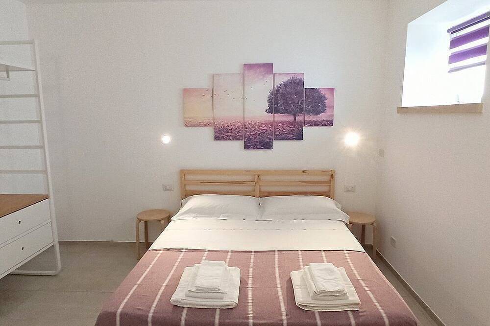 Villa Eliria A: A graceful apartment situated at a short distance from the beach, with Free Wi-Fi. in Torre Vado, Gulf of Taranto