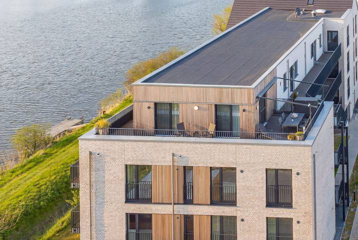 Ferienwohnung für 4 Personen, mit Balkon und Terrasse sowie Sauna und Seeblick in Nordstrand